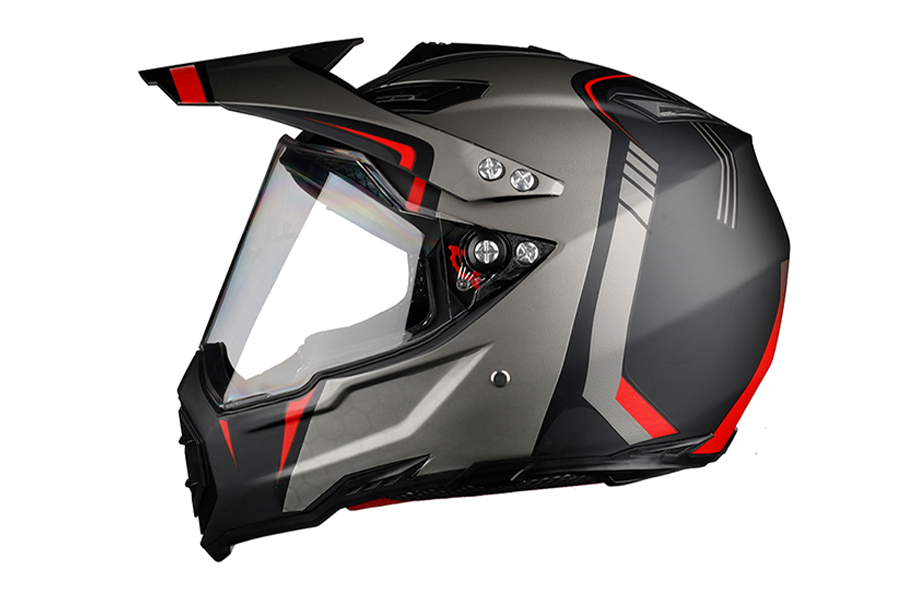 A grey full-face motorcycle off-road helmet