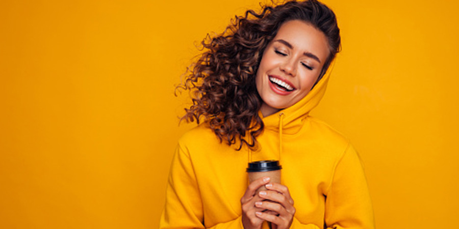 Woman in a bright yellow top