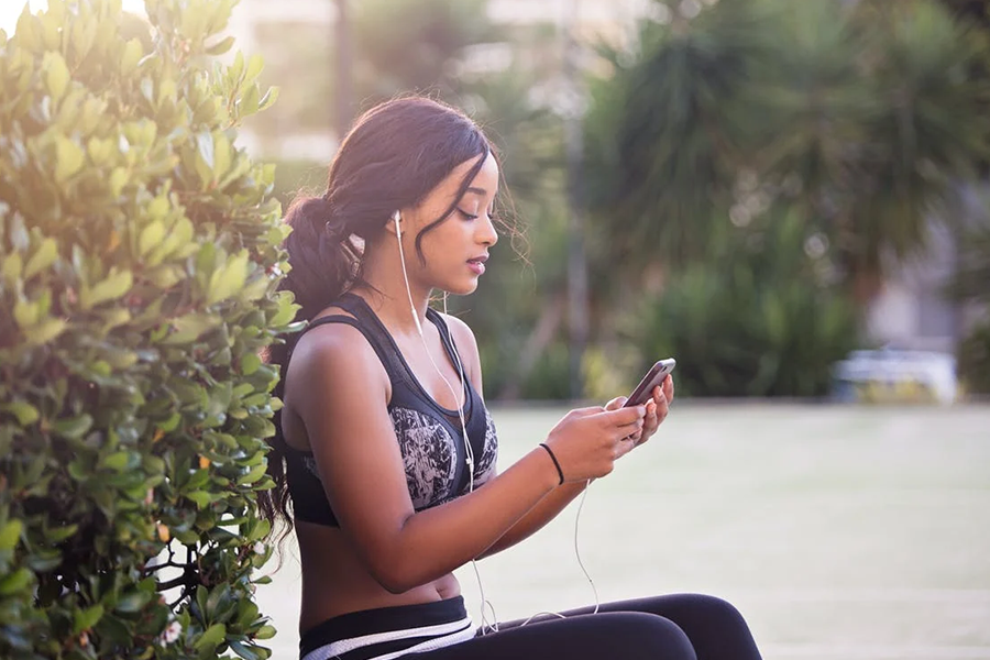 Woman wearing stylish activewear outdoors