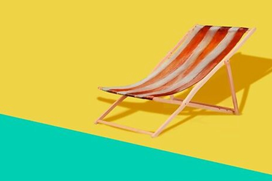 A stripped foldable beach chairs in a photo studio