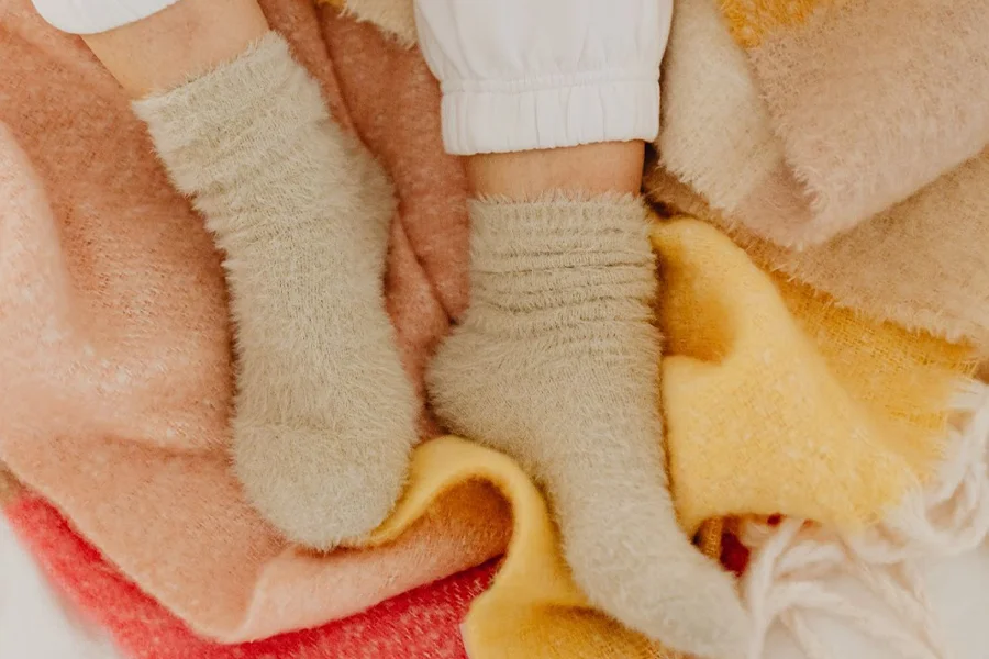 A woman wearing beige color socks