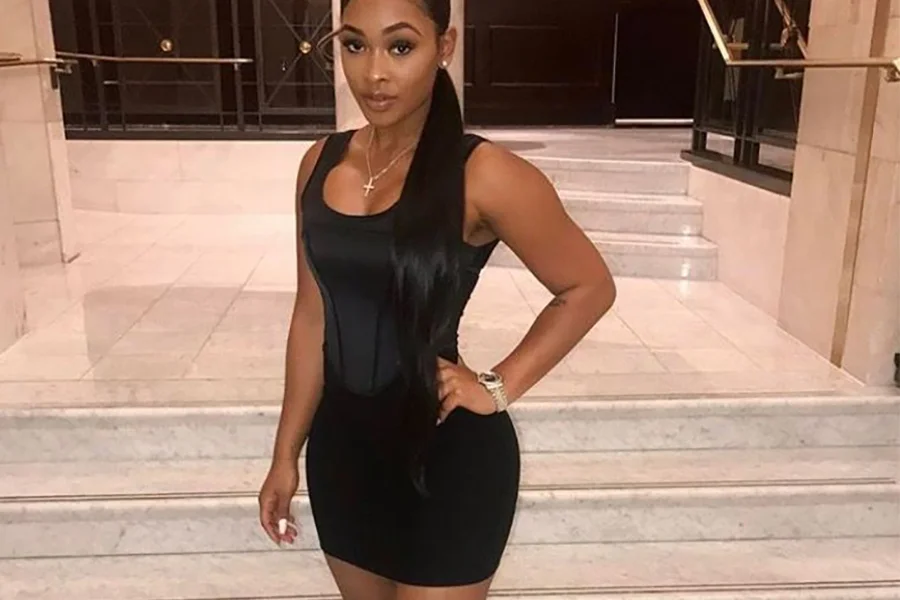 Beautiful African American rocking a short black dress