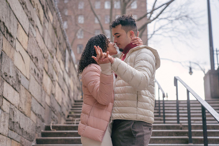 Couple wearing the same puffer jackets