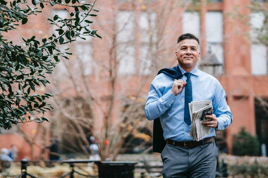 Man rocking blue dress shirt and tie outdoors