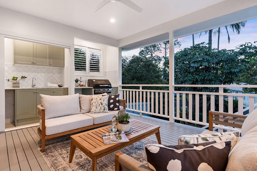 Well-furnished extended outdoor living room space