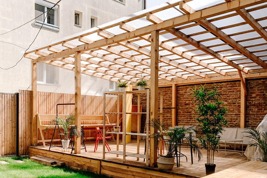 Wooden deck with overarching pergola