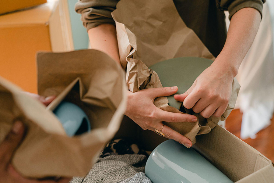 Wrapping fragile items with paper