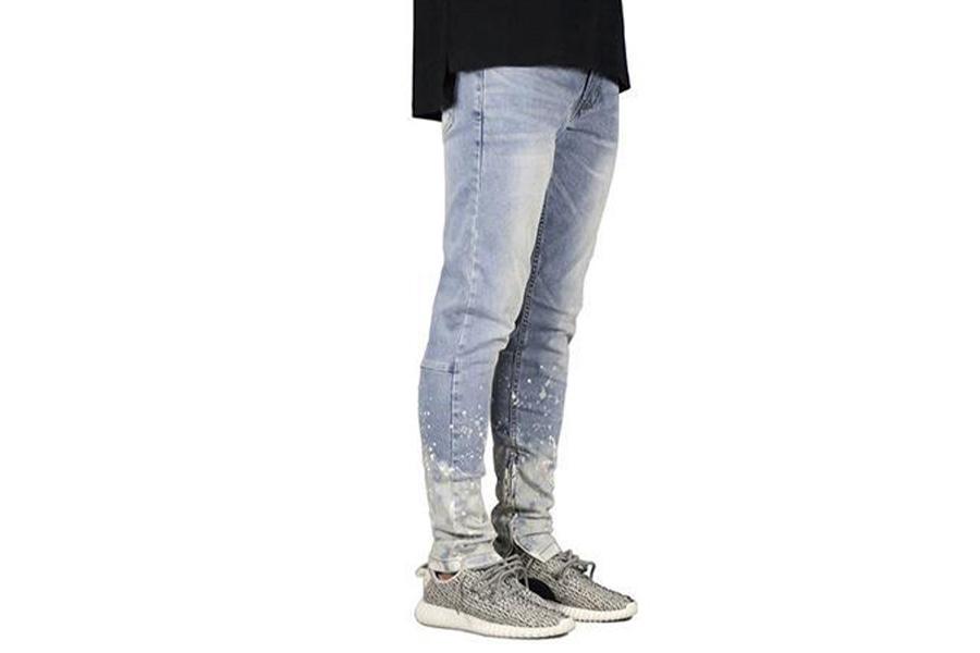 A man in color gradient denims