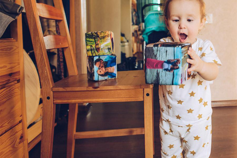 A toddler rocking a graphic-designed cozy set