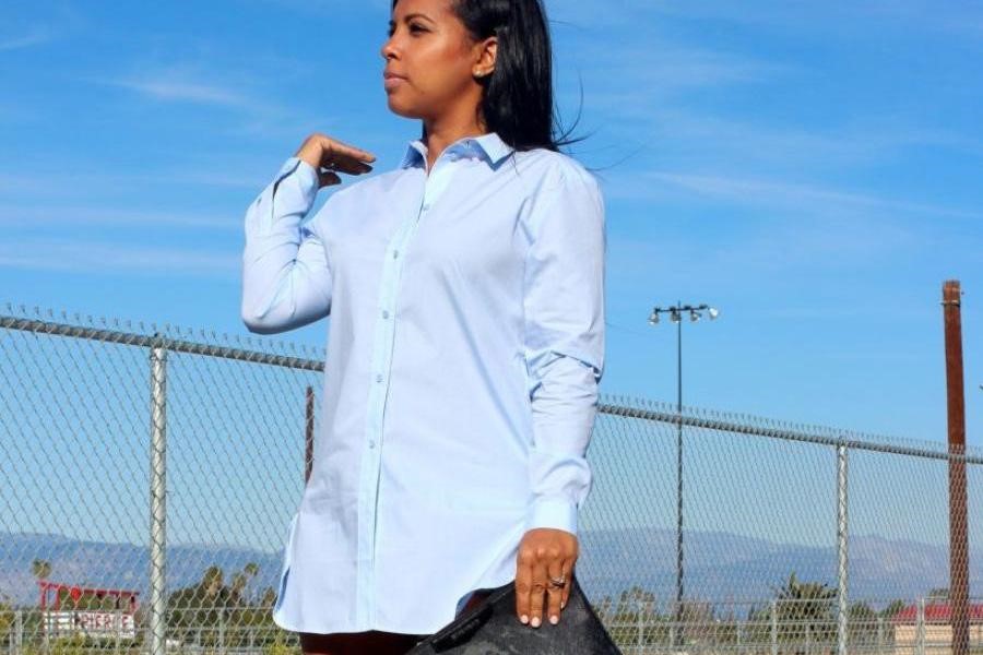 A woman wearing a smart casual shirt