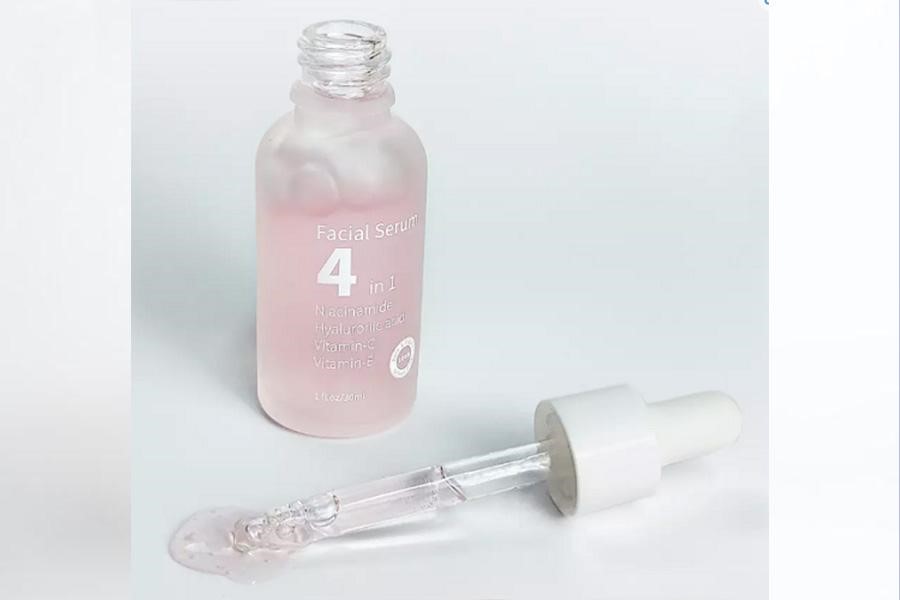 Glass bottle of vitamin C serum