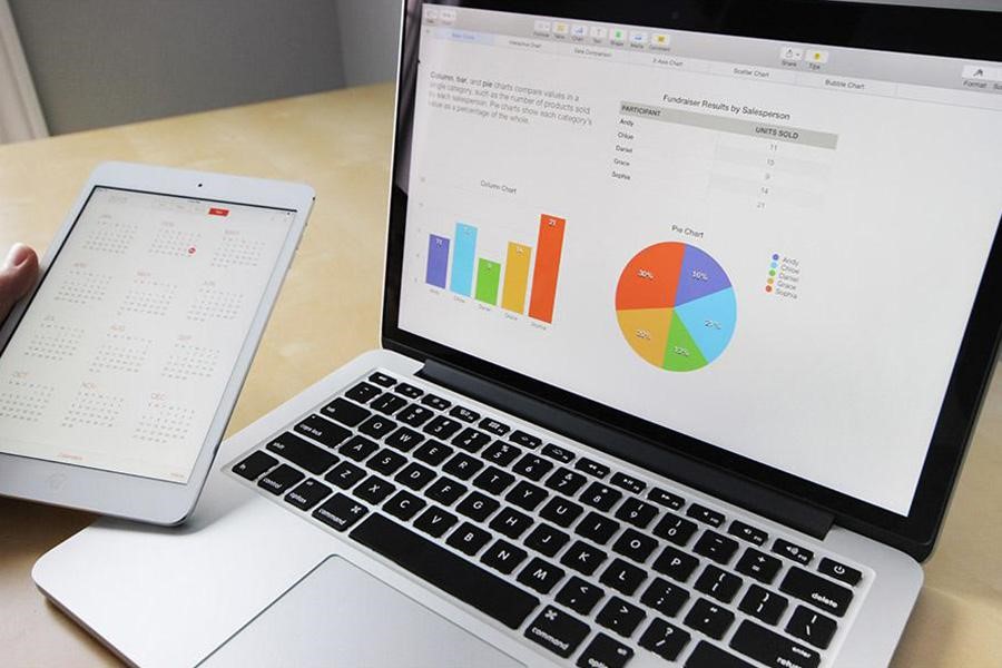 Laptop and tab showing analytics chart