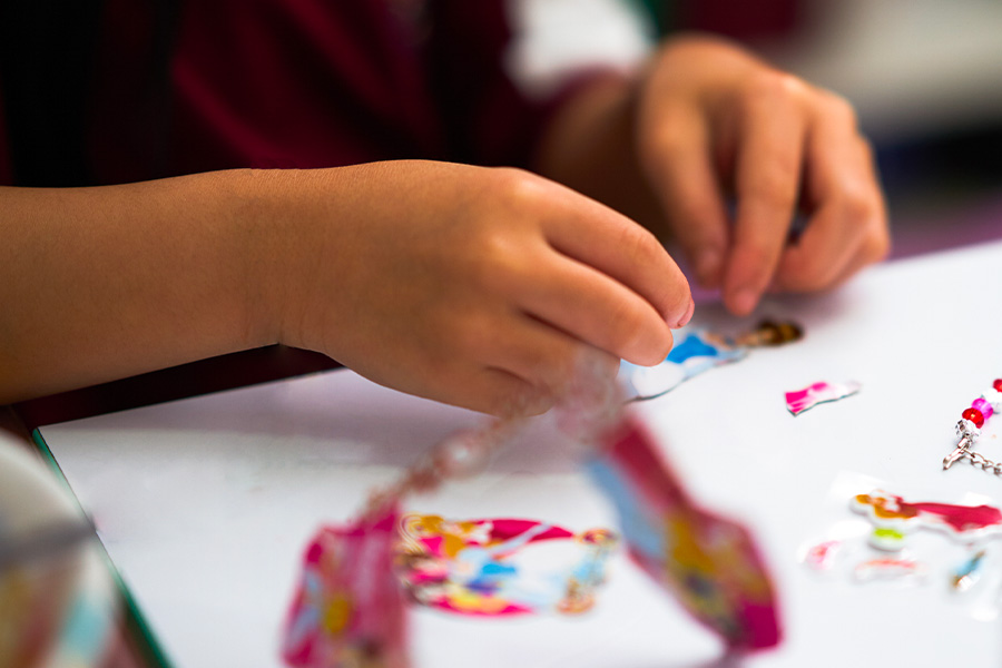 Person using stickers on paper