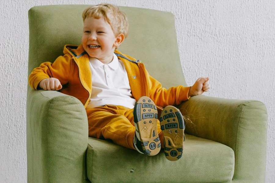 Young boy in a matching tracksuit