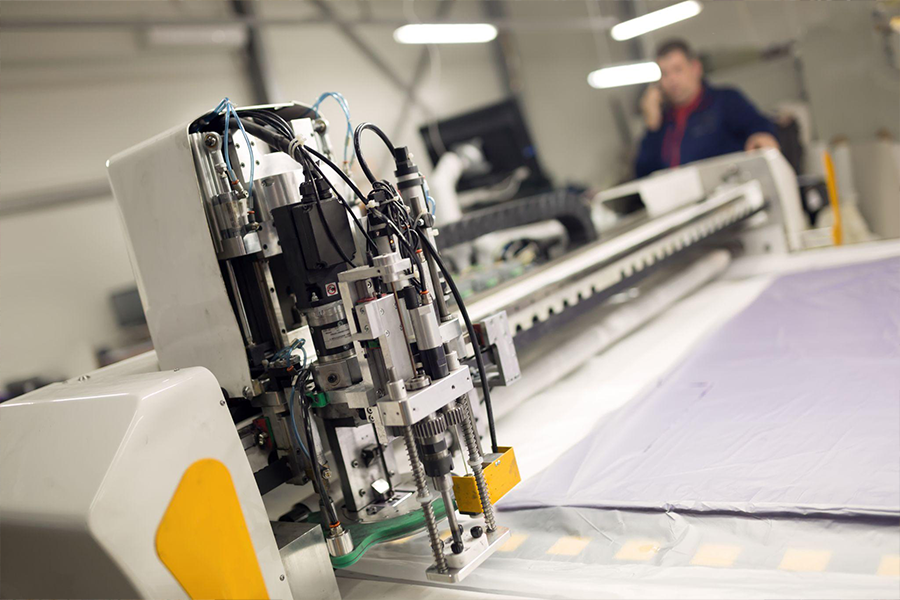 Fabric spreading machine during operation