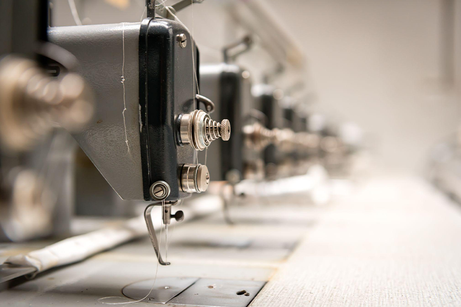 Industrial sewing machine during operation