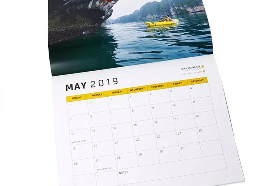 Wall calendar with photo of a lake as May image