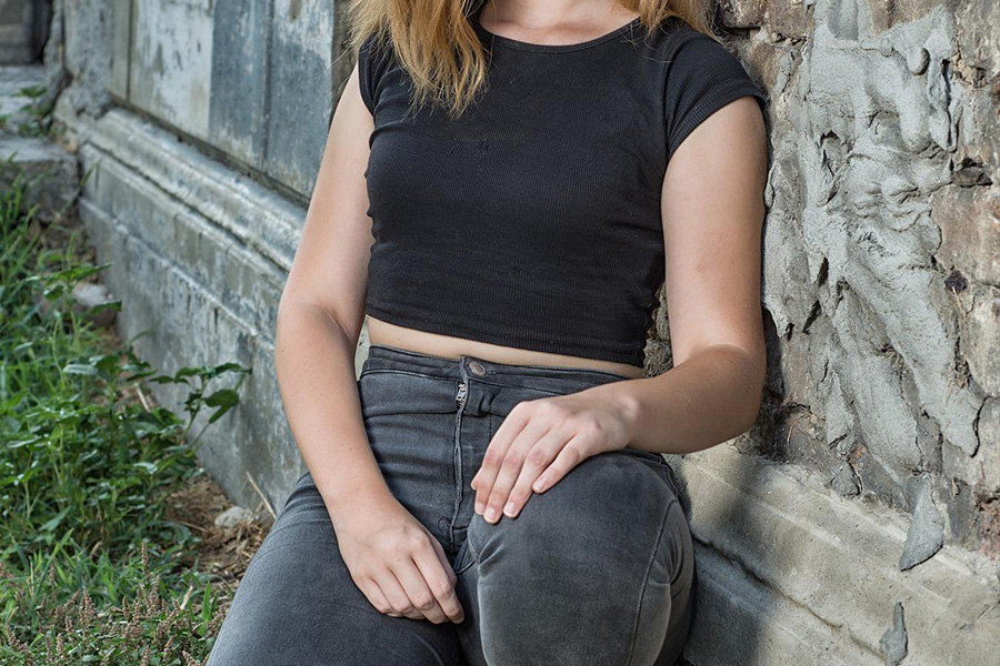 Woman wearing dark-wash denim jeans