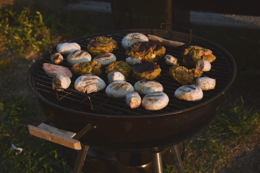 Outdoor grilling on portable black grill