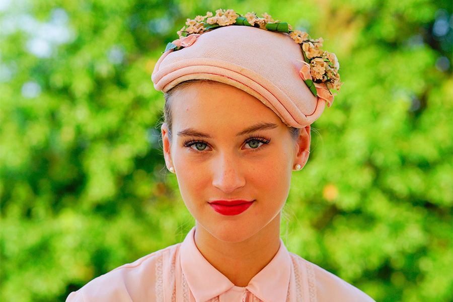 Beautiful woman rocking a pink half-hat