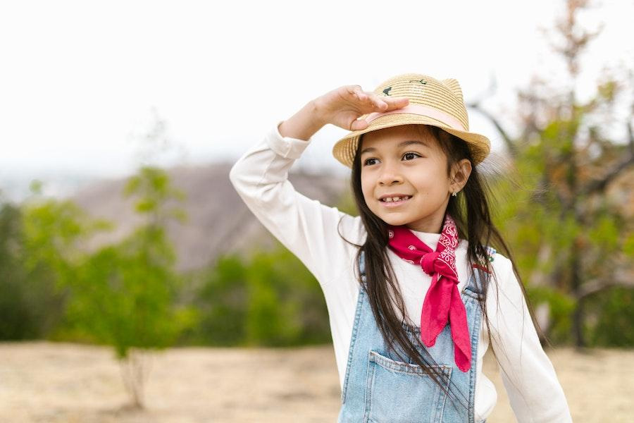 Little girl rocking a crochet bucket hat