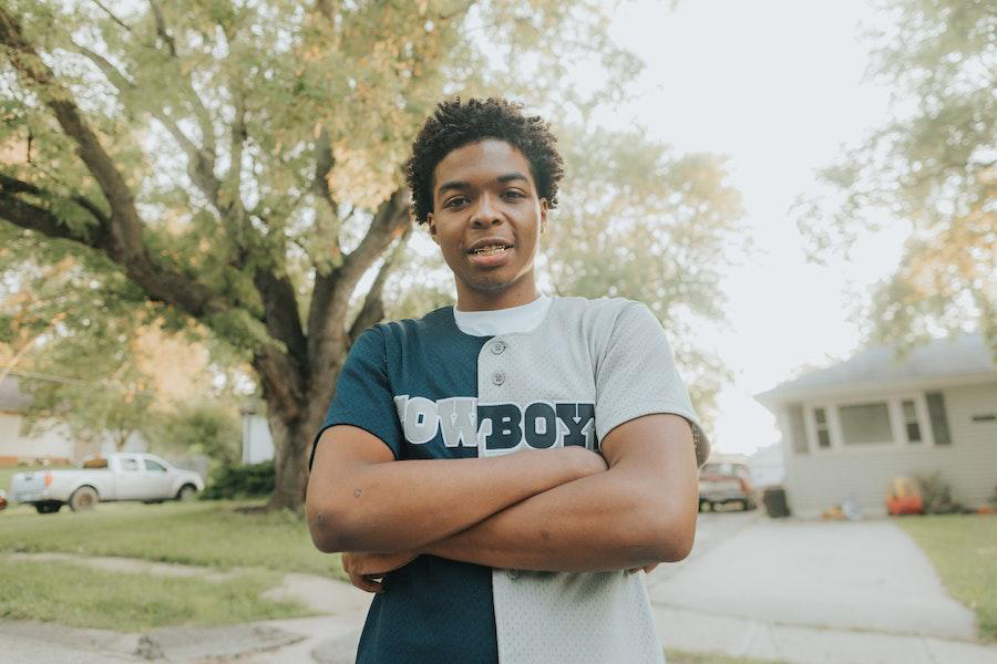 man wearing a baseball shirt