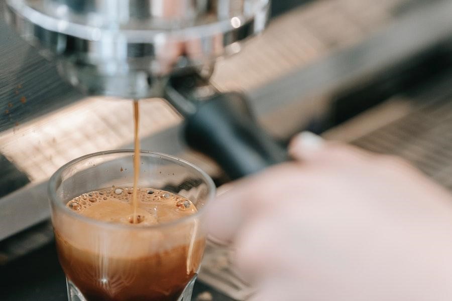 Coffee pouring from a coffee machine