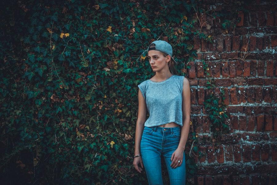 Woman rocking a light blue denim baseball cap