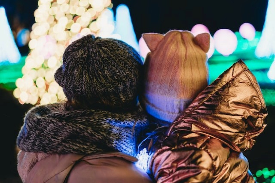 A Woman And Child Wearing Knit Beanie Hats