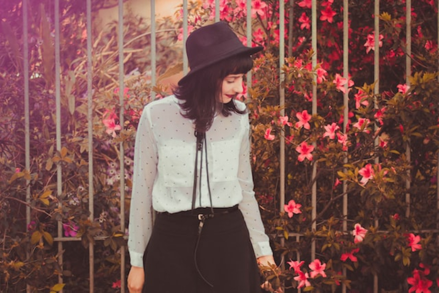 A Woman Wearing A Black Wool Fedora